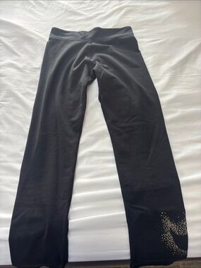 Nike Kids Black Leggings with Gold Swoosh Detail